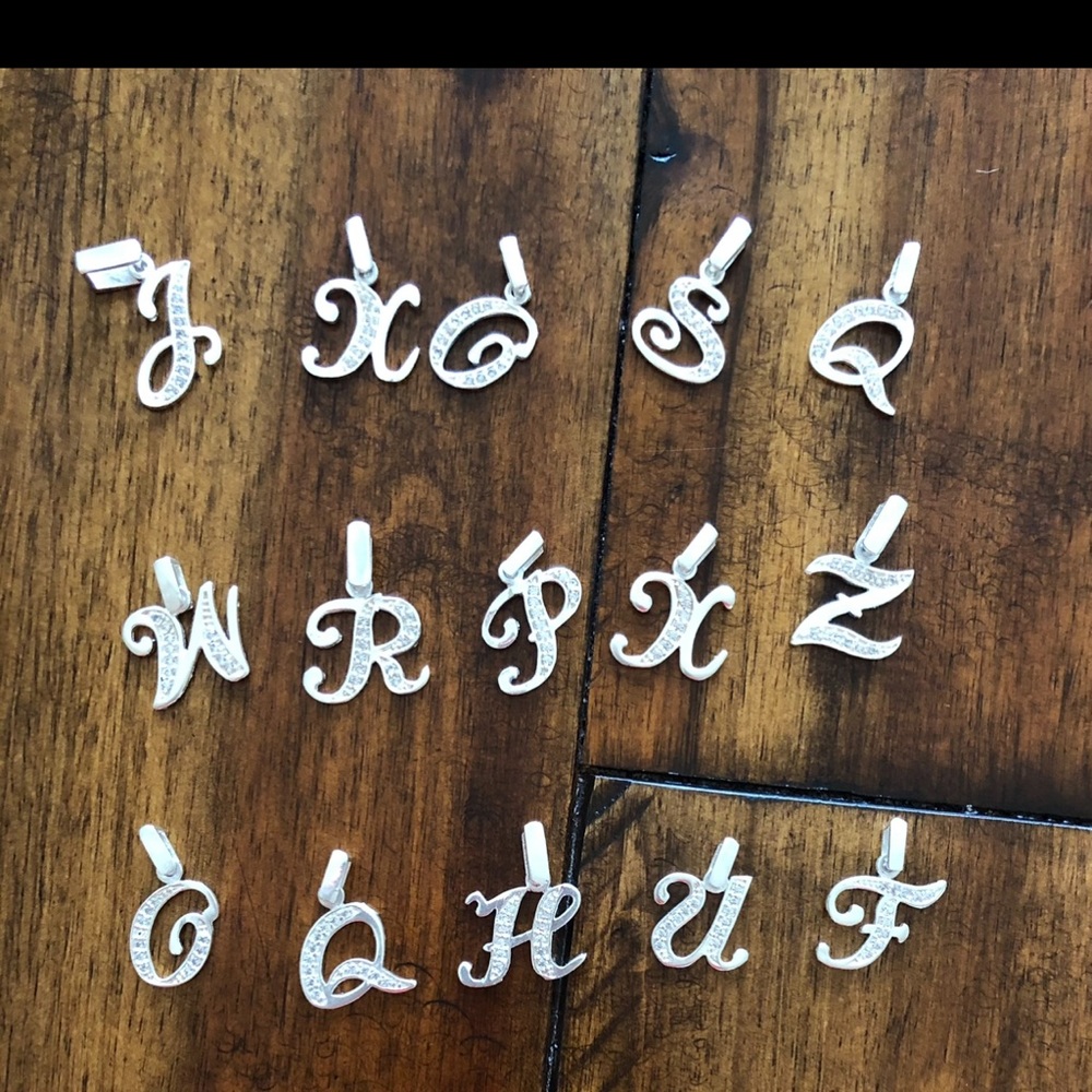 Letter pendant, silver.